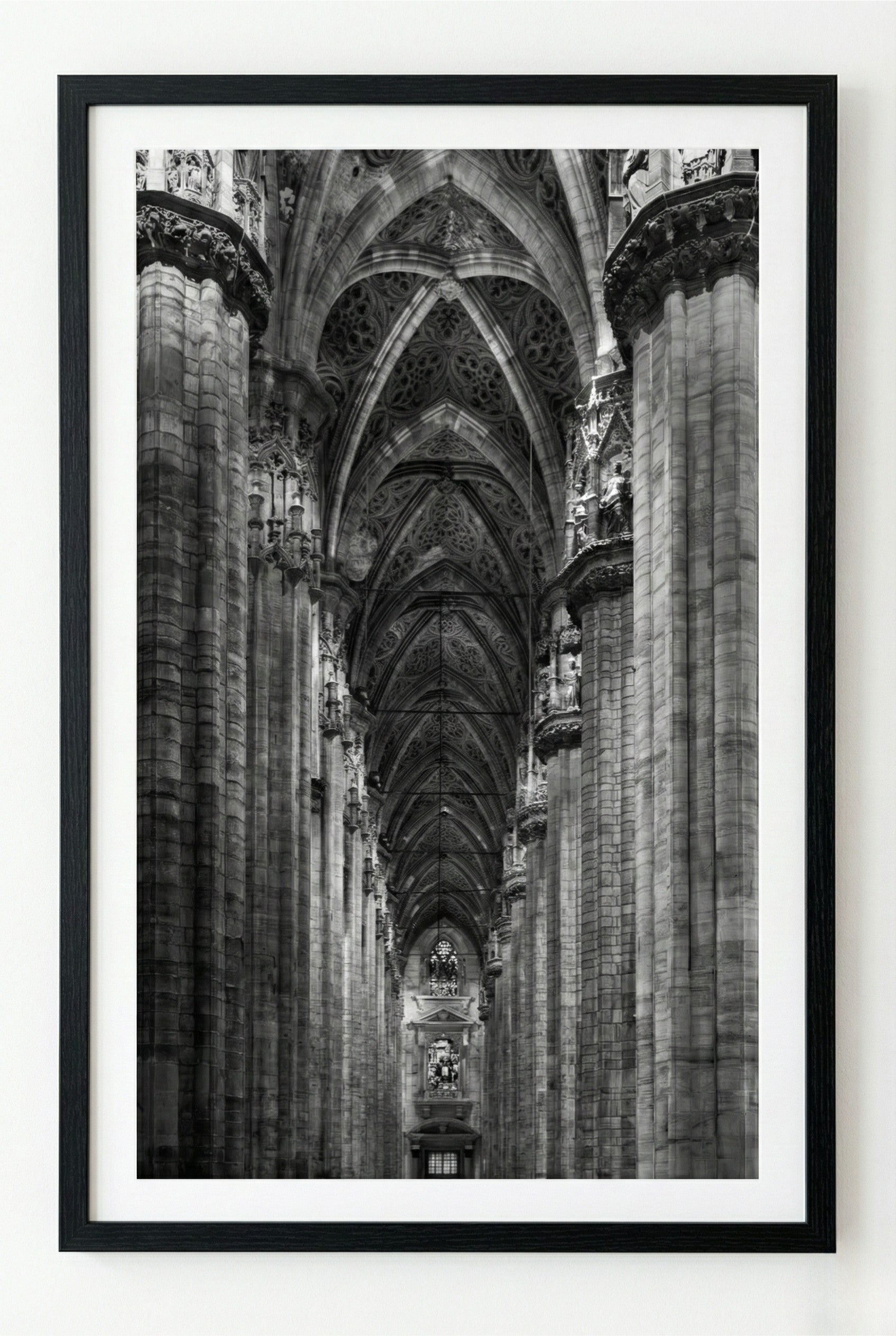 Framed black and white photograph of a cathedral interior