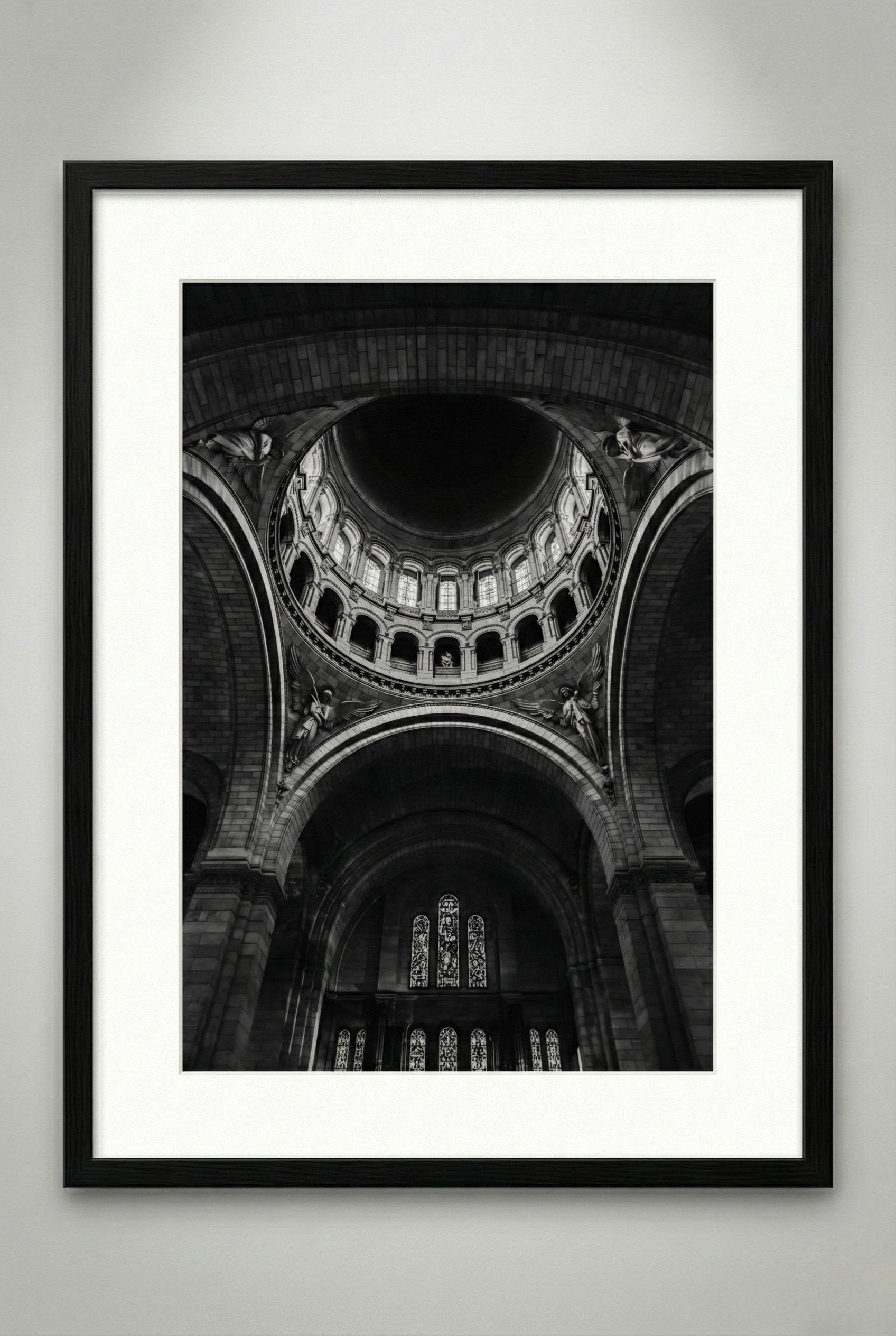Framed black and white photograph of a cathedral interior